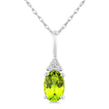 1/50 Ctw Oval Cut 6X4 MM Peridot and Round Cut Diamond Semi-Precious Pendant With Chain in 14K White Gold