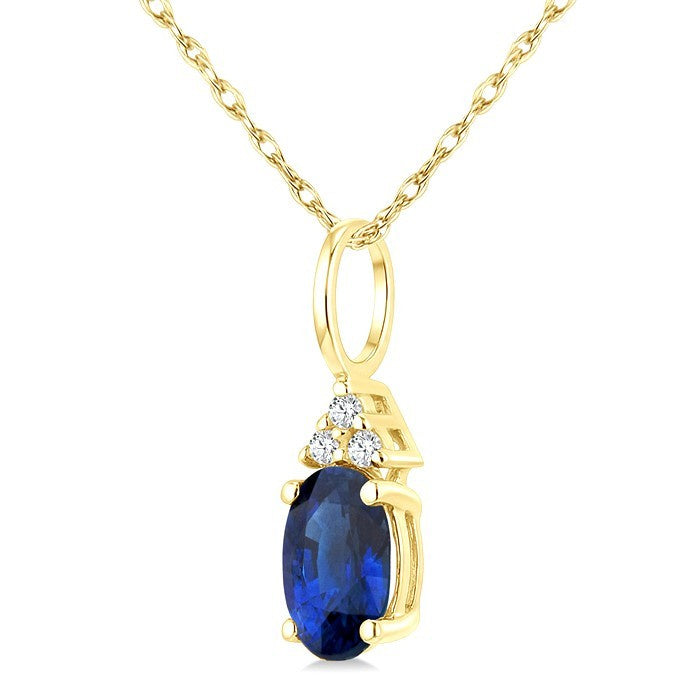 1/50 Ctw Oval Cut 6X4 MM Sapphire and Round Cut Diamond Precious Pendant With Chain in 14K Yellow Gold
