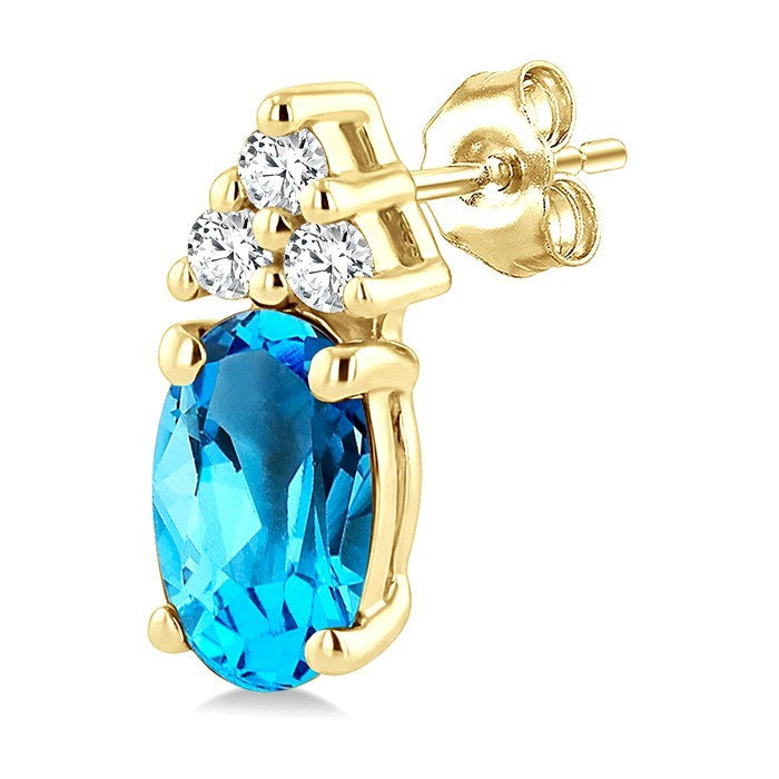 1/20 Ctw Oval Cut 5X3 MM Blue Topaz and Round Cut Diamond semi-precious Earrings in 10K Yellow Gold