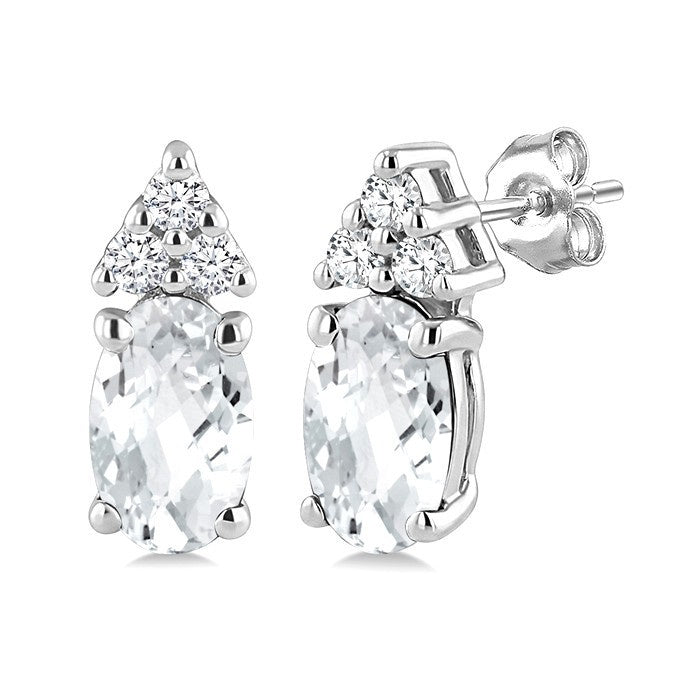 1/20 Ctw Oval Cut 5X3 MM White Topaz and Round Cut Diamond semi-precious Earrings in 10K White Gold
