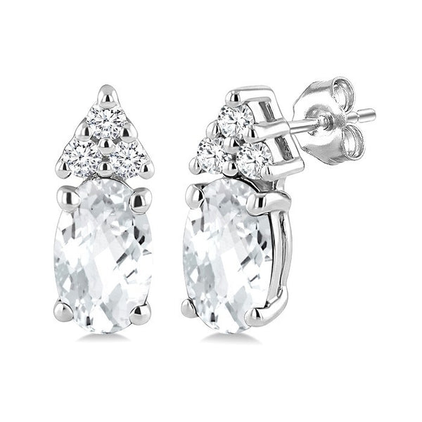 1/20 Ctw Oval Cut 5X3 MM White Topaz and Round Cut Diamond semi-precious Earrings in 10K White Gold