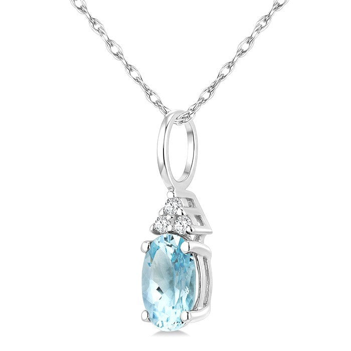 1/50 Ctw Oval Cut 6X4 MM Aquamarine and Round Cut Diamond semi-precious Pendant With Chain in 10K white Gold