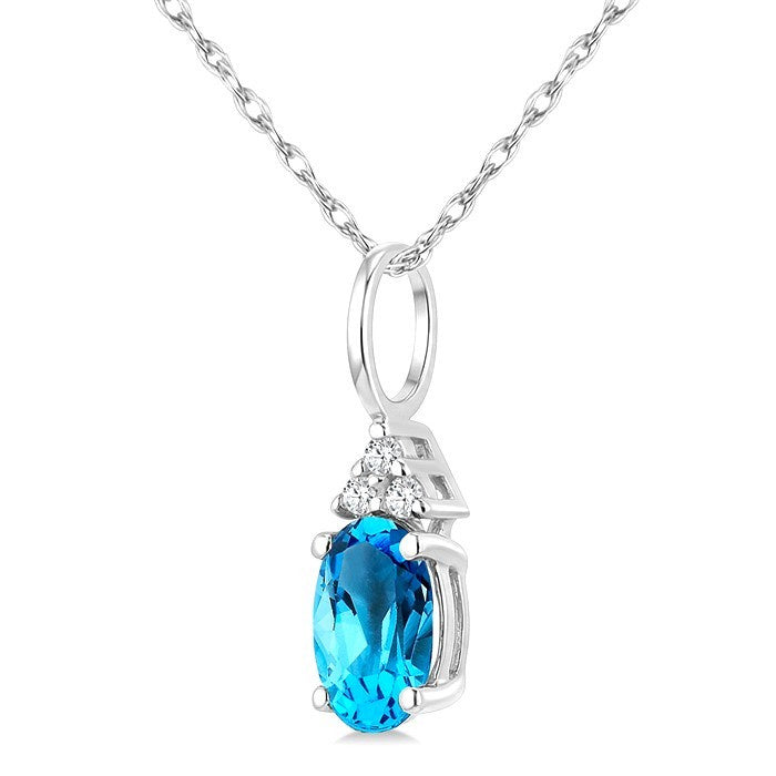 1/50 Ctw Oval Cut 6X4 MM Blue Topaz and Round Cut Diamond semi-precious Pendant With Chain in 10K White Gold