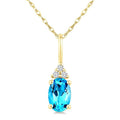 1/50 Ctw Oval Cut 6X4 MM Blue Topaz and Round Cut Diamond semi-precious Pendant With Chain in 10K Yellow Gold