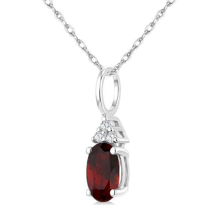 1/50 Ctw Oval Cut 6X4 MM Garnet and Round Cut Diamond Semi-Precious Pendant With Chain in 10K White Gold