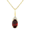 1/50 Ctw Oval Cut 6X4 MM Garnet and Round Cut Diamond Semi-Precious Pendant With Chain in 10K Yellow Gold