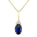 1/50 Ctw Oval Cut 6X4 MM Sapphire and Round Cut Diamond Precious Pendant With Chain in 10K Yellow Gold