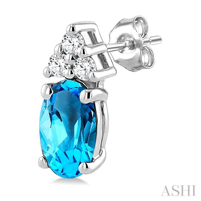 1/20 Ctw Oval Cut 5X3 MM Blue Topaz and Round Cut Diamond semi-precious Earrings in 14K White Gold