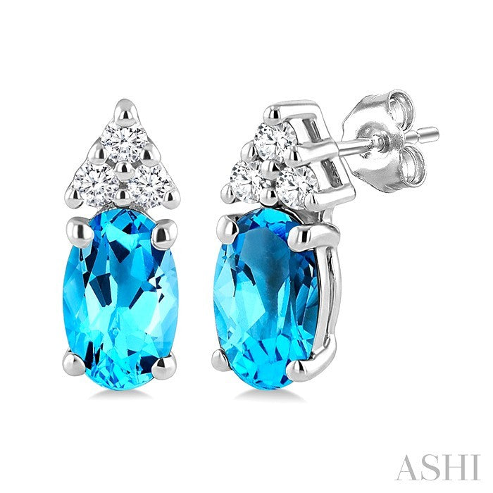 1/20 Ctw Oval Cut 5X3 MM Blue Topaz and Round Cut Diamond semi-precious Earrings in 14K White Gold