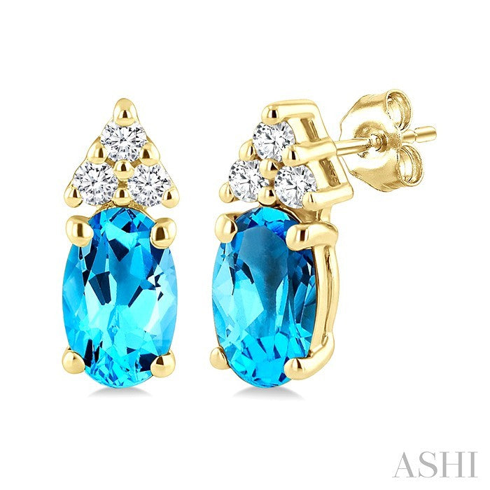 1/20 Ctw Oval Cut 5X3 MM Blue Topaz and Round Cut Diamond semi-precious Earrings in 14K Yellow Gold