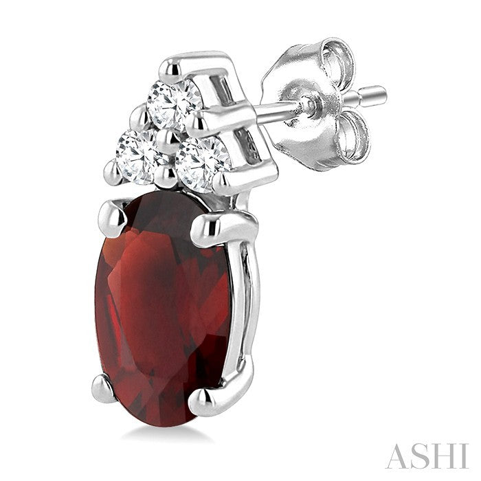 1/20 Ctw Oval Cut 5X3 MM Garnet and Round Cut Diamond semi-precious Earrings in 14K White Gold