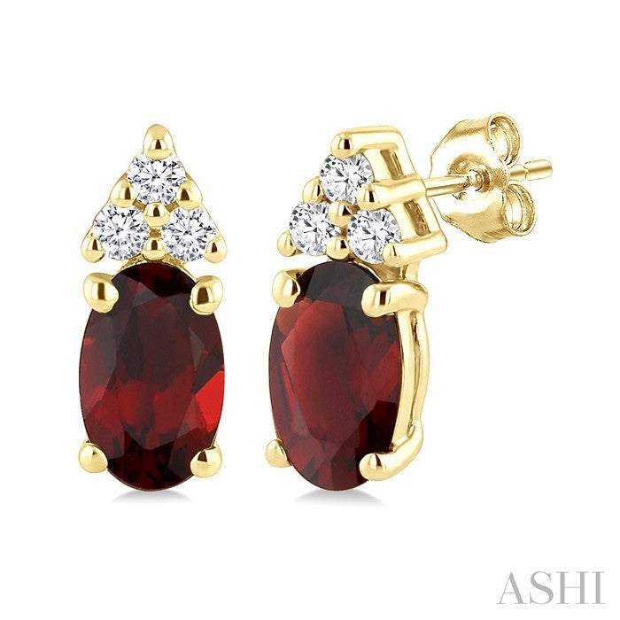 1/20 Ctw Oval Cut 5X3 MM Garnet and Round Cut Diamond semi-precious Earrings in 14K Yellow Gold