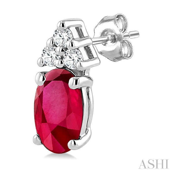 1/20 Ctw Oval Cut 5X3 MM Ruby and Round Cut Diamond Precious Earrings in 14K White Gold