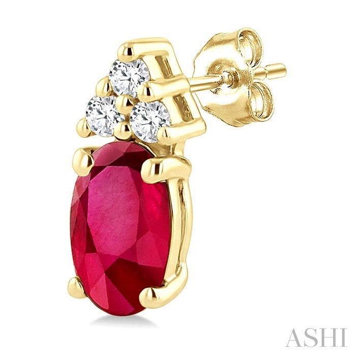 1/20 Ctw Oval Cut 5X3 MM Ruby and Round Cut Diamond Precious Earrings in 14K Yellow Gold
