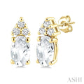1/20 Ctw Oval Cut 5X3 MM White Topaz and Round Cut Diamond semi-precious Earrings in 14K Yellow Gold