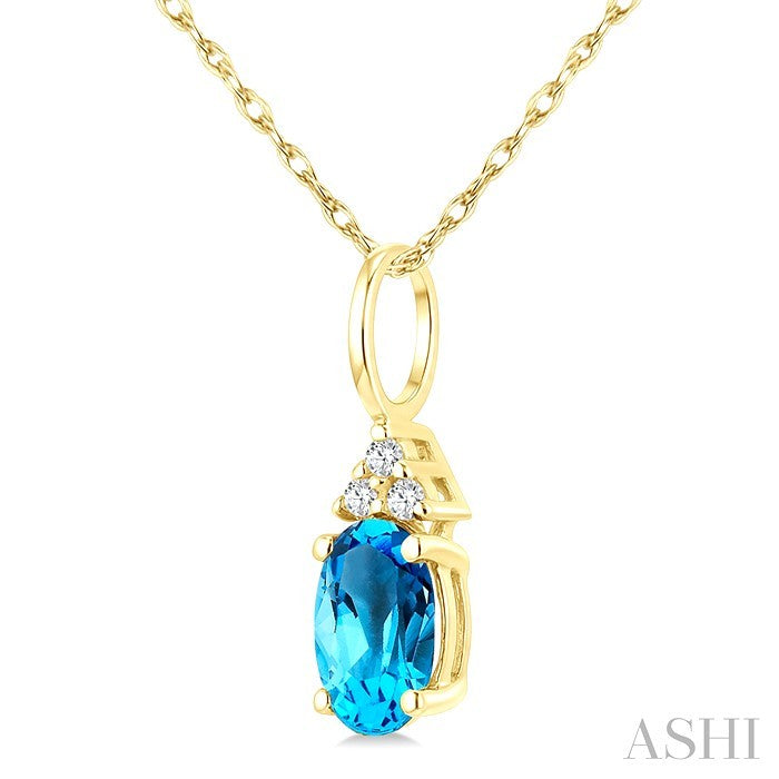 1/50 Ctw Oval Cut 6X4 MM Blue Topaz and Round Cut Diamond semi-precious Pendant With Chain in 14K Yellow Gold