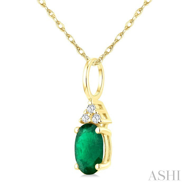 1/50 Ctw Oval Cut 6X4 MM Emerald and Round Cut Diamond Precious Pendant With Chain in 14K Yellow Gold