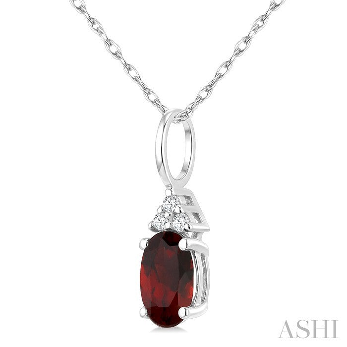 1/50 Ctw Oval Cut 6X4 MM Garnet and Round Cut Diamond Semi-Precious Pendant With Chain in 14K White Gold