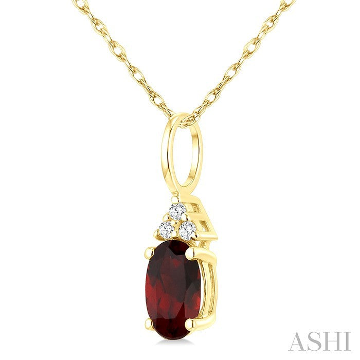 1/50 Ctw Oval Cut 6X4 MM Garnet and Round Cut Diamond Semi-Precious Pendant With Chain in 14K Yellow Gold