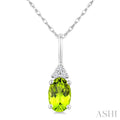 1/50 Ctw Oval Cut 6X4 MM Peridot and Round Cut Diamond Semi-Precious Pendant With Chain in 14K White Gold