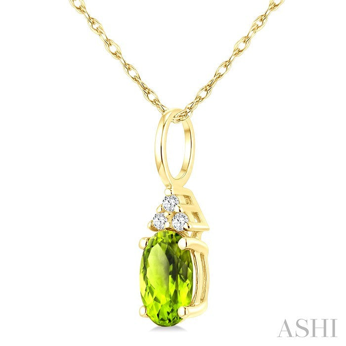 1/50 Ctw Oval Cut 6X4 MM Peridot and Round Cut Diamond Semi-Precious Pendant With Chain in 14K Yellow Gold