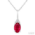 1/50 Ctw Oval Cut 6X4 MM Ruby and Round Cut Diamond Precious Pendant With Chain in 14K White Gold