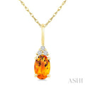 1/50 Ctw Oval Cut 6X4 MM Citrine and Round Cut Diamond semi-precious Pendant With Chain in 10K Yellow Gold