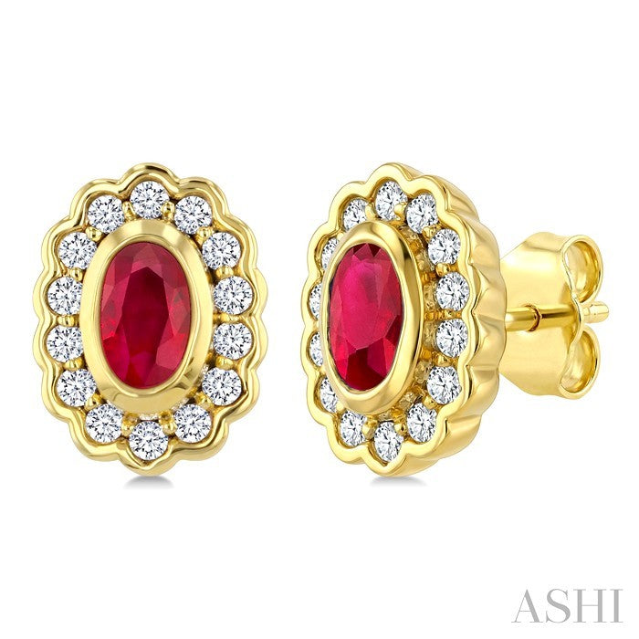 5X3 MM Oval Shape Ruby and 1/5 Ctw Round Cut Diamond Bold Precious Earrings in 10K Yellow Gold