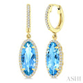 12X5 MM Evoque Gemstones Oval Shape Blue Topaz and 1/3 Ctw Round Cut Diamond Semi-Precious Earrings in 10K Yellow Gold