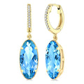 12X5 MM Evoque Gemstones Oval Shape Blue Topaz and 1/10 Ctw Round Cut Diamond Semi-Precious Earrings in 10K Yellow Gold
