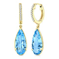 12X5 MM Evoque Gemstones Pear Shape Blue Topaz and 1/10 Ctw Round Cut Diamond Semi-Precious Earrings in 10K Yellow Gold