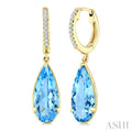 12X5 MM Evoque Gemstones Pear Shape Blue Topaz and 1/10 Ctw Round Cut Diamond Semi-Precious Earrings in 10K Yellow Gold
