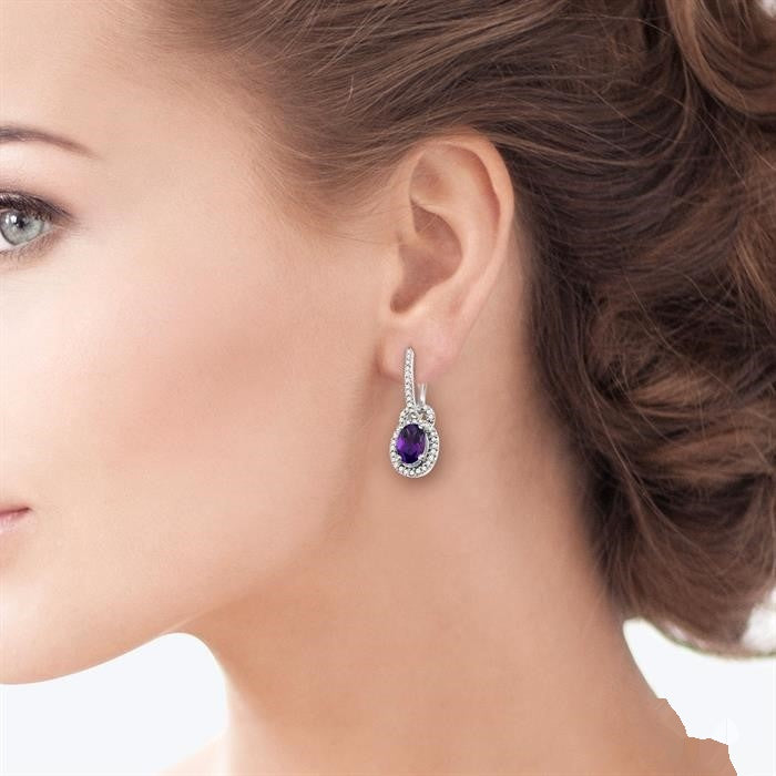 Oval Cut Amethyst and 1/3 Ctw Round Cut Diamond Earrings in 14K White Gold