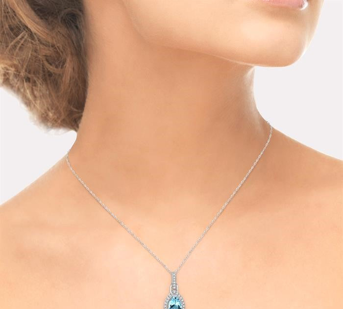 7x5 MM Pear Shape Aquamarine and 1/10 Ctw Round Cut Diamond Pendant in 10K White Gold with Chain