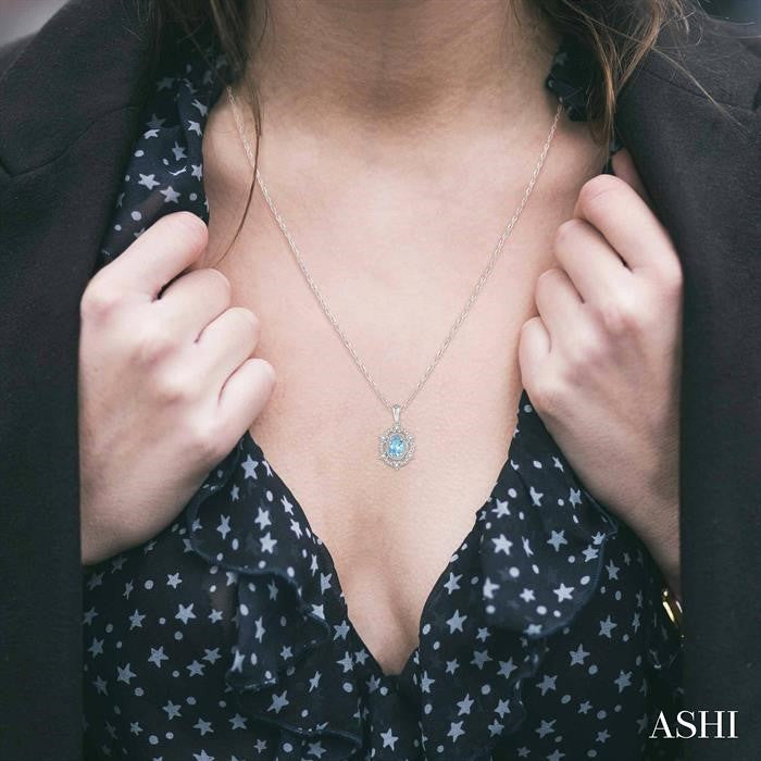 6x4 MM Oval Cut Aquamarine and 1/6 Ctw Round Cut Diamond Semi-Precious Pendant With Chain in 10K White Gold