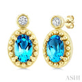 6X4 MM Oval Cut Blue Topaz and 1/20 Ctw Round Cut Bead Bijoux Diamond Semi-Precious Beaded Earrings in 10K Yellow Gold