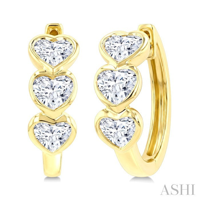 1 1/5 Ctw Bezel Set 6 Stone Heart Cut Diamond Huggie Earrings in 14K Yellow Gold