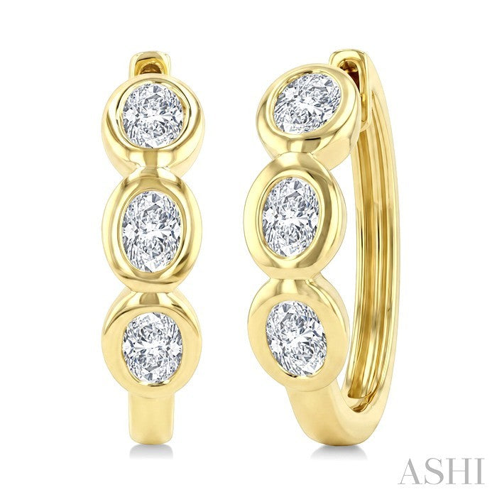 7/8 Ctw Bezel Set 6 Stone Oval Cut Diamond Huggie Earrings in 14K Yellow Gold