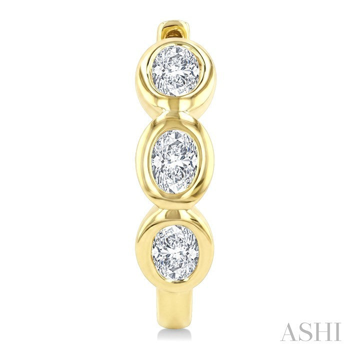 7/8 Ctw Bezel Set 6 Stone Oval Cut Diamond Huggie Earrings in 14K Yellow Gold