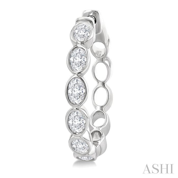 1 1/10 Ctw Bezel Set Oval Cut Diamond Fashion Hoop Earrings in 14K White Gold