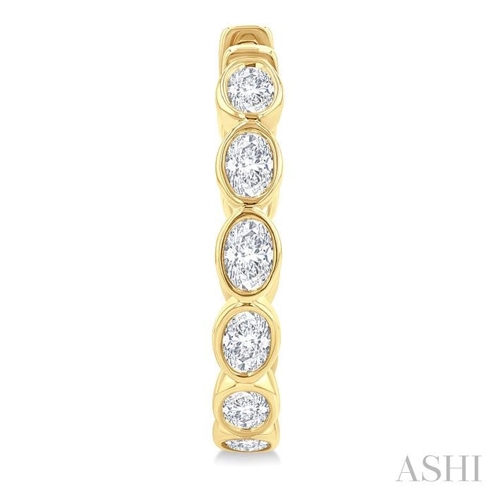 1 1/10 Ctw Bezel Set Oval Cut Diamond Fashion Hoop Earrings in 14K Yellow Gold