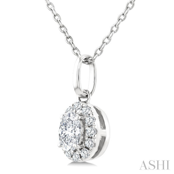 1/4 Ctw Oval and Round Cut Diamond Fashion Halo Pendant in 14K White Gold