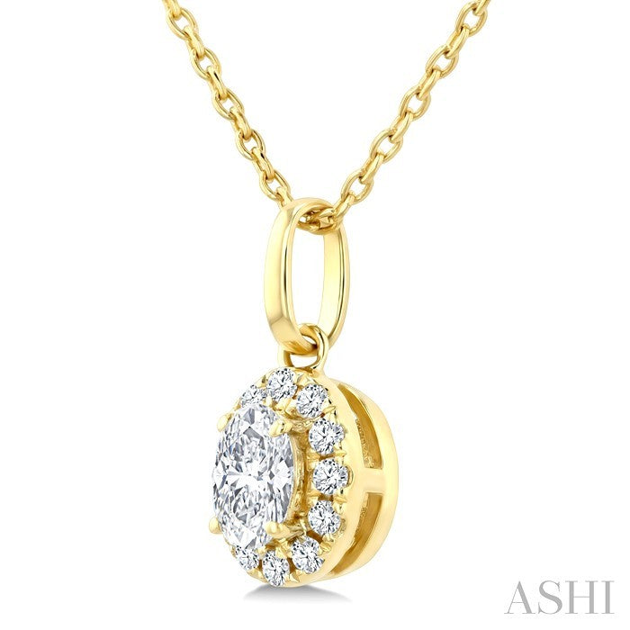1/4 Ctw Oval and Round Cut Diamond Fashion Halo Pendant With Chain in 14K Yellow Gold