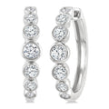 1 1/10 Ctw Graduated Bezel Set Round Cut Diamond Fashion Hoop Earrings in 14K White Gold