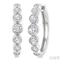 1 1/10 Ctw Graduated Bezel Set Round Cut Diamond Fashion Hoop Earrings in 14K White Gold