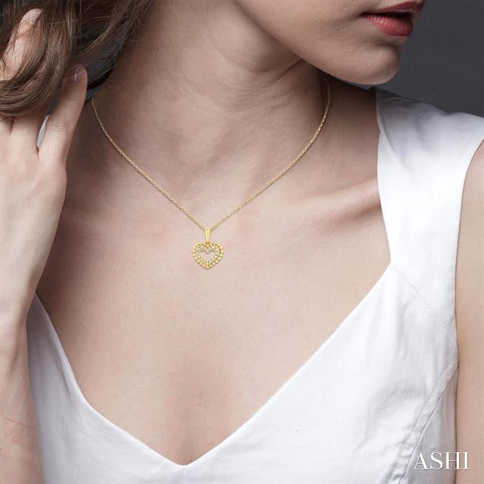 1/10 Ctw Petite Heart Round Cut Diamond Fashion Pendant With Chain in 10K Yellow Gold