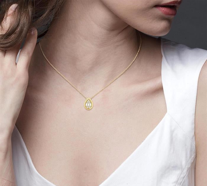 1/6 Ctw Petite Bezel Set Pear Shape Fusion Baguette and Round Cut Diamond Fashion Pendant With Chain in 10K Yellow Gold