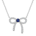 2.40 MM Round Shape Sapphire and 1/8 Ctw Bow Round Cut Diamond Fashion Pendant With Chain in 10k White Gold