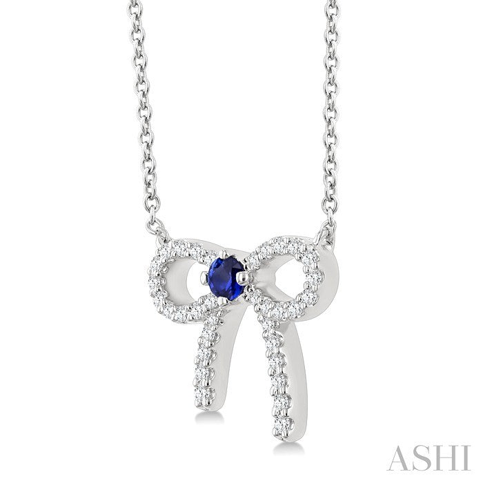 2.40 MM Round Shape Sapphire and 1/8 Ctw Bow Round Cut Diamond Fashion Pendant With Chain in 10k White Gold
