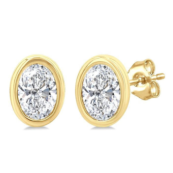1/5 Ctw Petite Bezel Set Oval Cut Diamond Fashion Stud Earrings in 10K Yellow Gold
